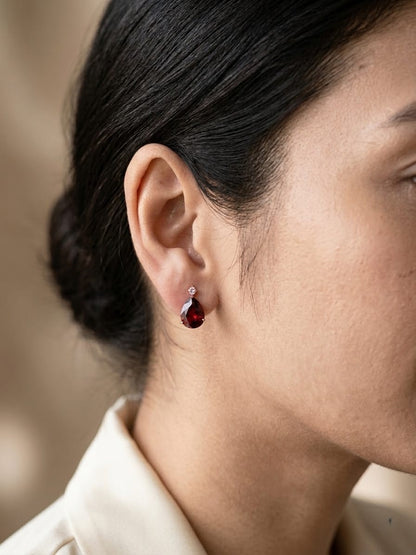 Garnet pear drop earrings with pink sapphire accents in 18K yellow gold Emirates Diamonds