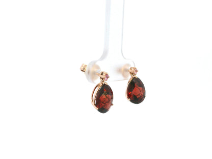 Garnet pear drop earrings with pink sapphire accents in 18K yellow gold Emirates Diamonds