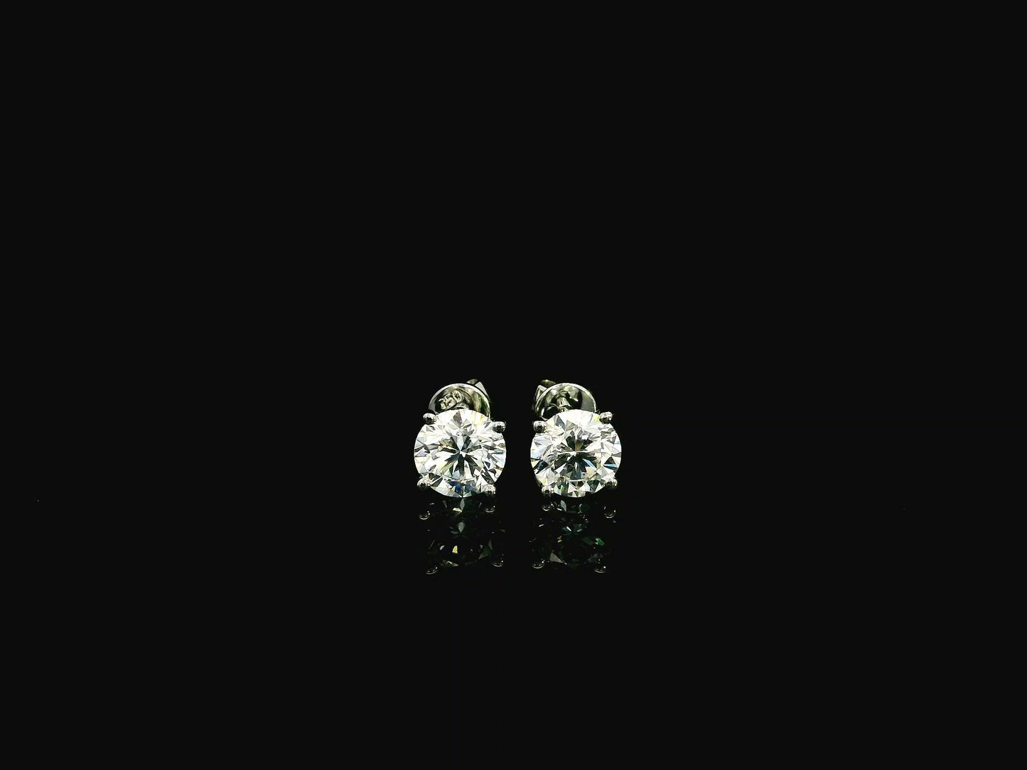 18K white gold diamond stud earrings 2.01 carat round brilliant GIA certified H color SI2 solitaire studs