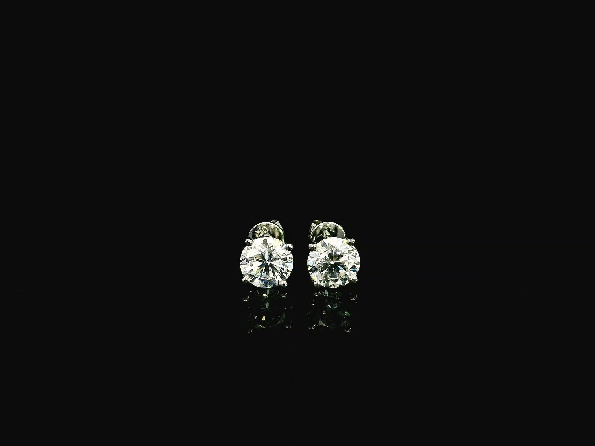 18K white gold diamond stud earrings 2.01 carat round brilliant GIA certified H color SI2 solitaire studs