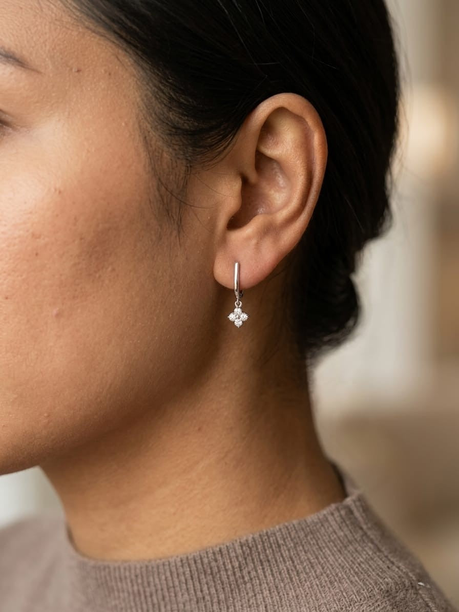 Minimal diamond drop earrings in 18K gold with round brilliant diamonds