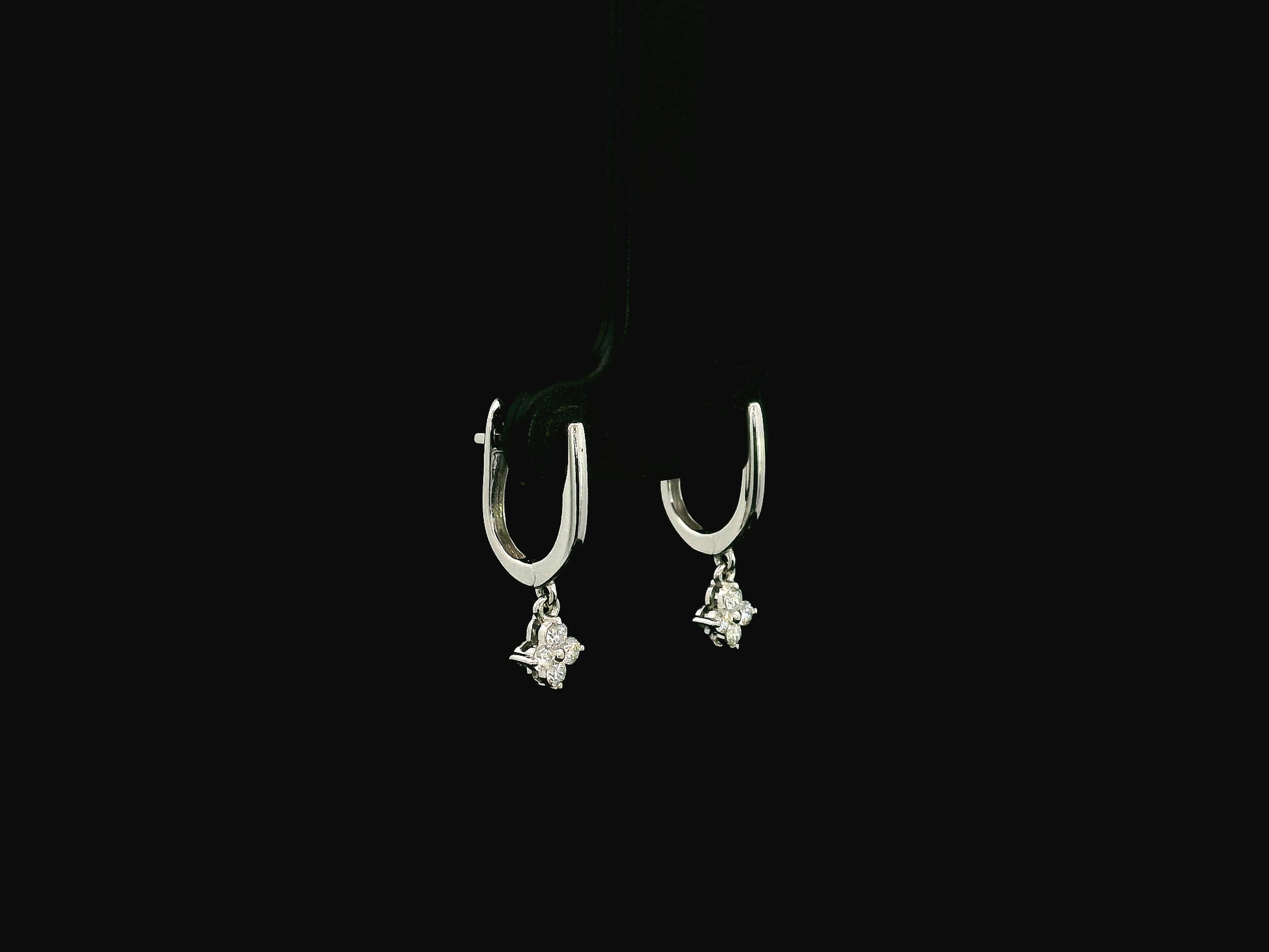 Minimal diamond drop earrings in 18K gold with round brilliant diamonds