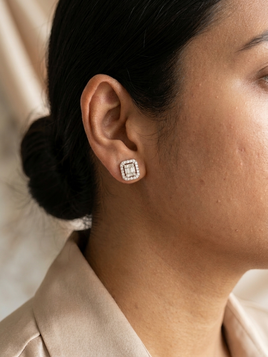 Baguette and round diamond halo stud earrings in 18K white gold Emirates Diamonds