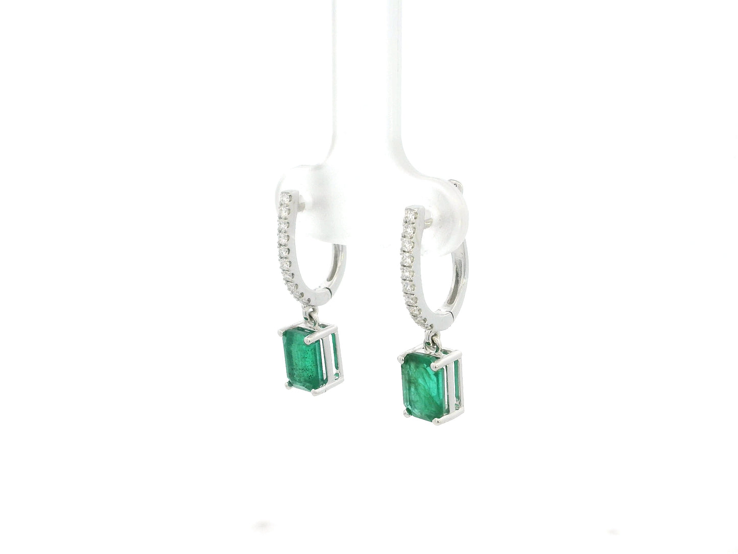 Emerald cut emerald drop earrings with diamond hoops in 18K white gold