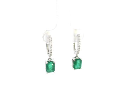 Emerald cut emerald drop earrings with diamond hoops in 18K white gold