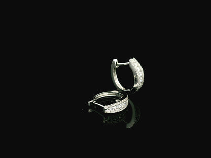 Diamond huggie hoop earrings in 18K white gold with pavé diamonds