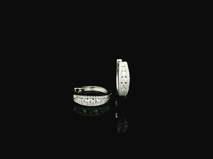 Diamond huggie hoop earrings in 18K white gold with pavé diamonds