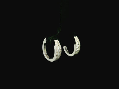Diamond huggie hoop earrings in 18K white gold with pavé diamonds