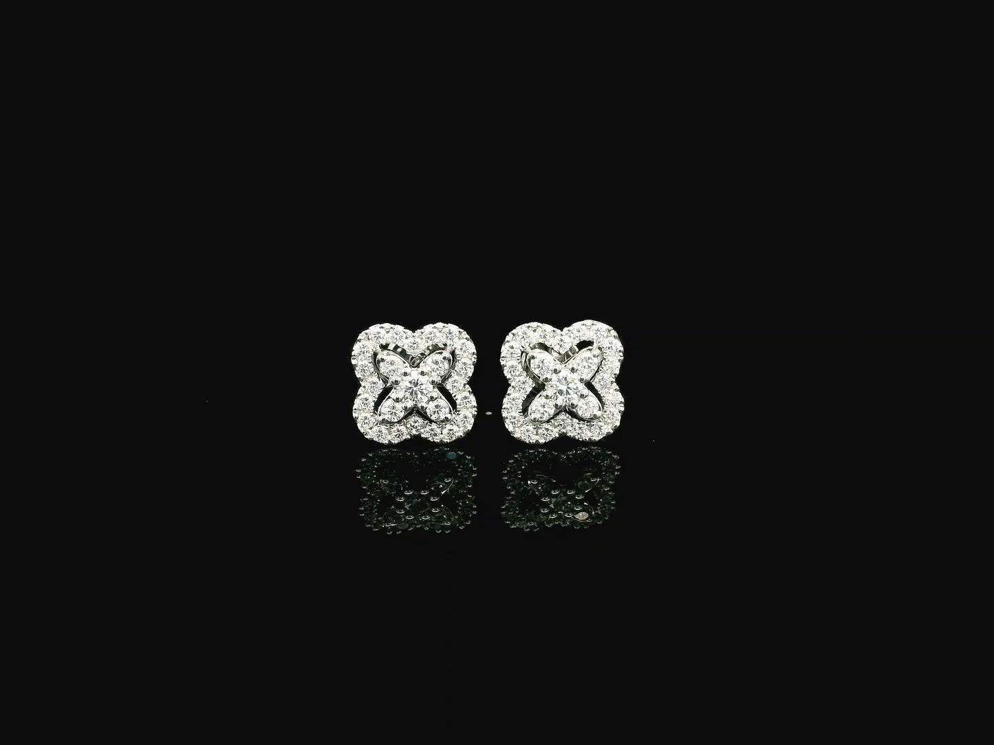 Diamond floral cluster stud earrings in 18K white gold by Emirates Diamonds
