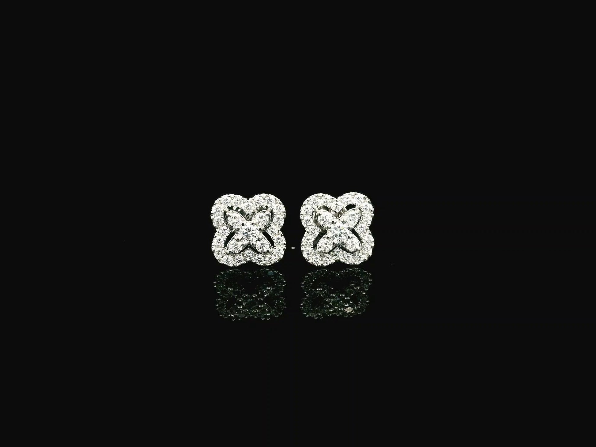 Diamond floral cluster stud earrings in 18K white gold by Emirates Diamonds