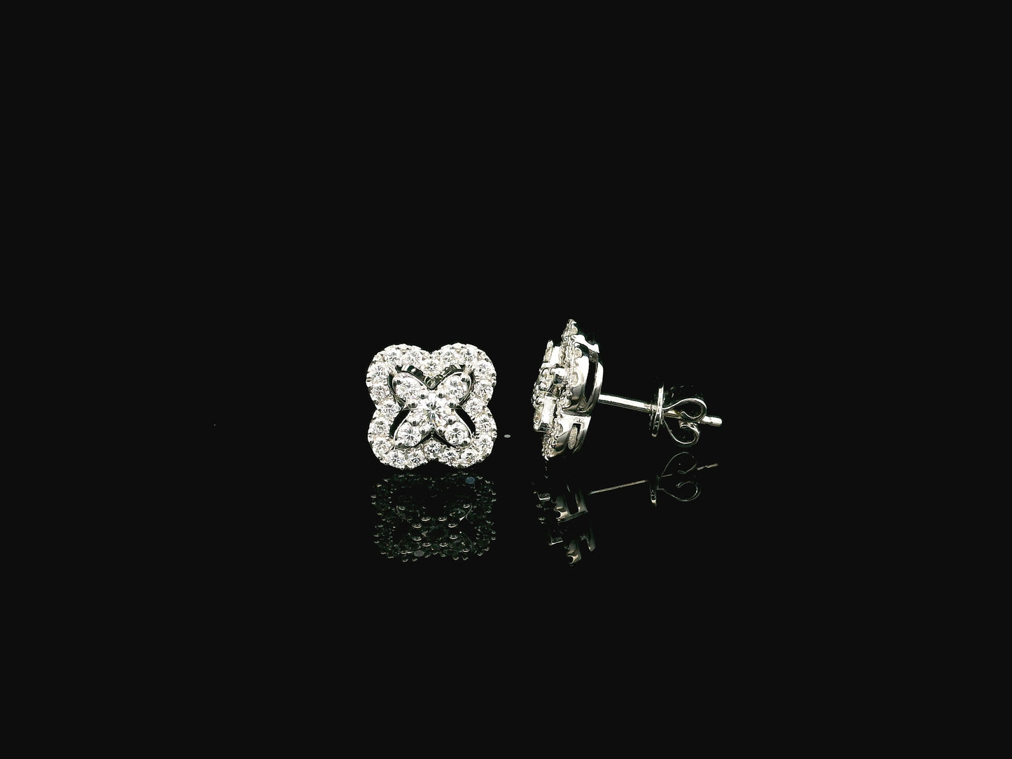 Diamond floral cluster stud earrings in 18K white gold by Emirates Diamonds