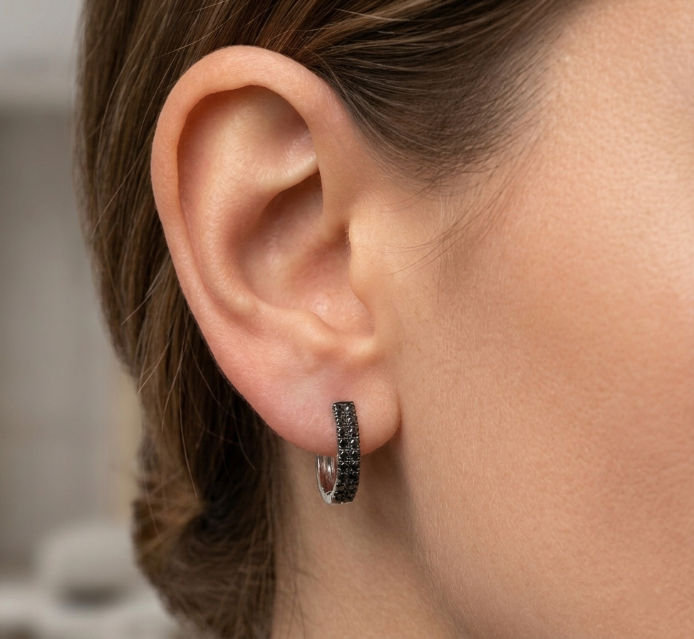 Black diamond hoop earrings in 18K white gold pavé design