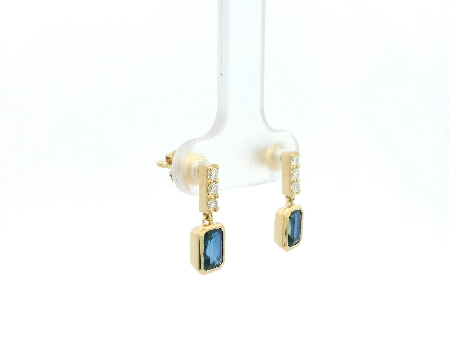 Blue sapphire and diamond drop earrings in 18K yellow gold emerald cut sapphire design