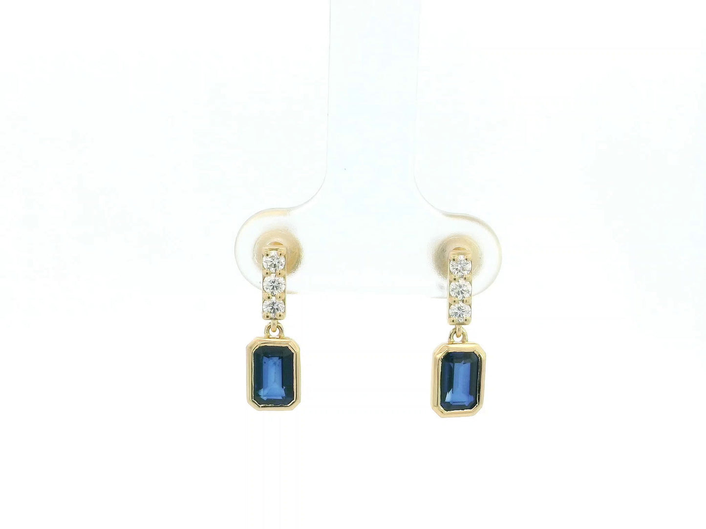 Blue sapphire and diamond drop earrings in 18K yellow gold emerald cut sapphire design