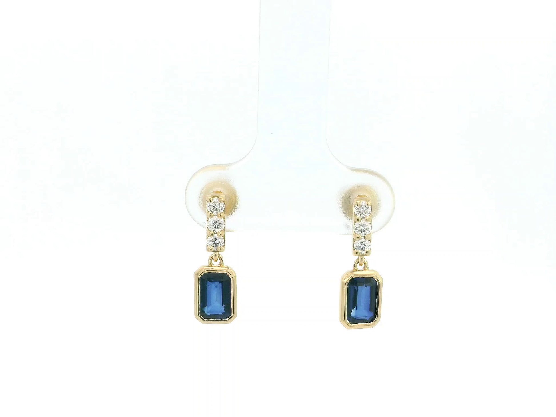 Blue sapphire and diamond drop earrings in 18K yellow gold emerald cut sapphire design
