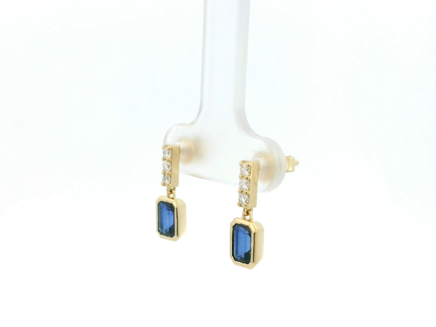 Blue sapphire and diamond drop earrings in 18K yellow gold emerald cut sapphire design