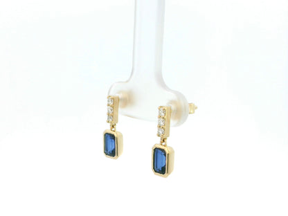 Blue sapphire and diamond drop earrings in 18K yellow gold emerald cut sapphire design