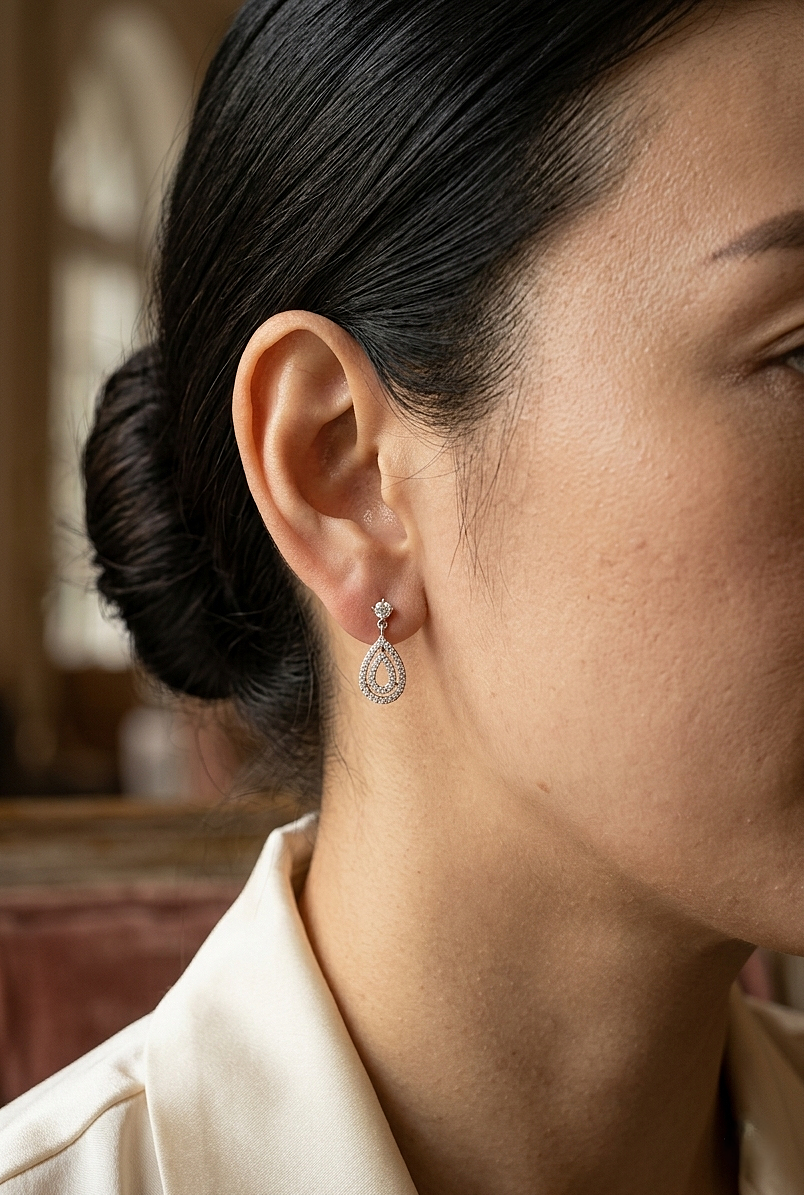Diamond teardrop drop earrings in 18K white gold pavé pear shape design