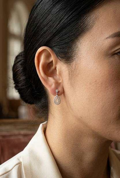 Diamond teardrop drop earrings in 18K white gold pavé pear shape design
