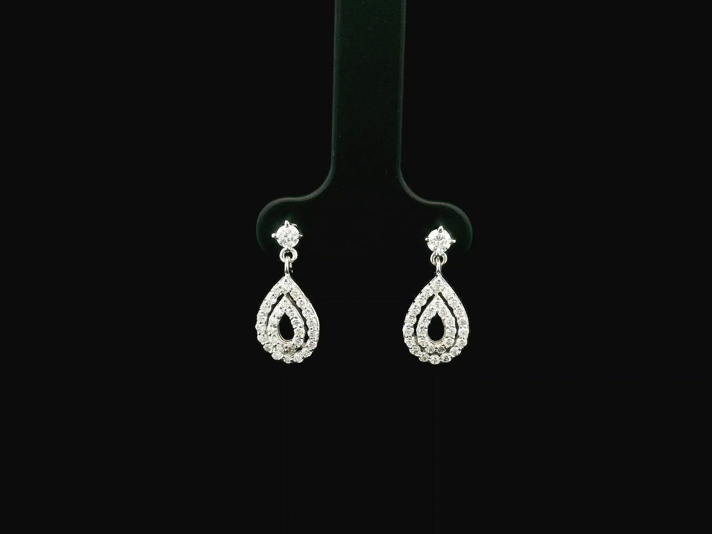 Diamond teardrop drop earrings in 18K white gold pavé pear shape design