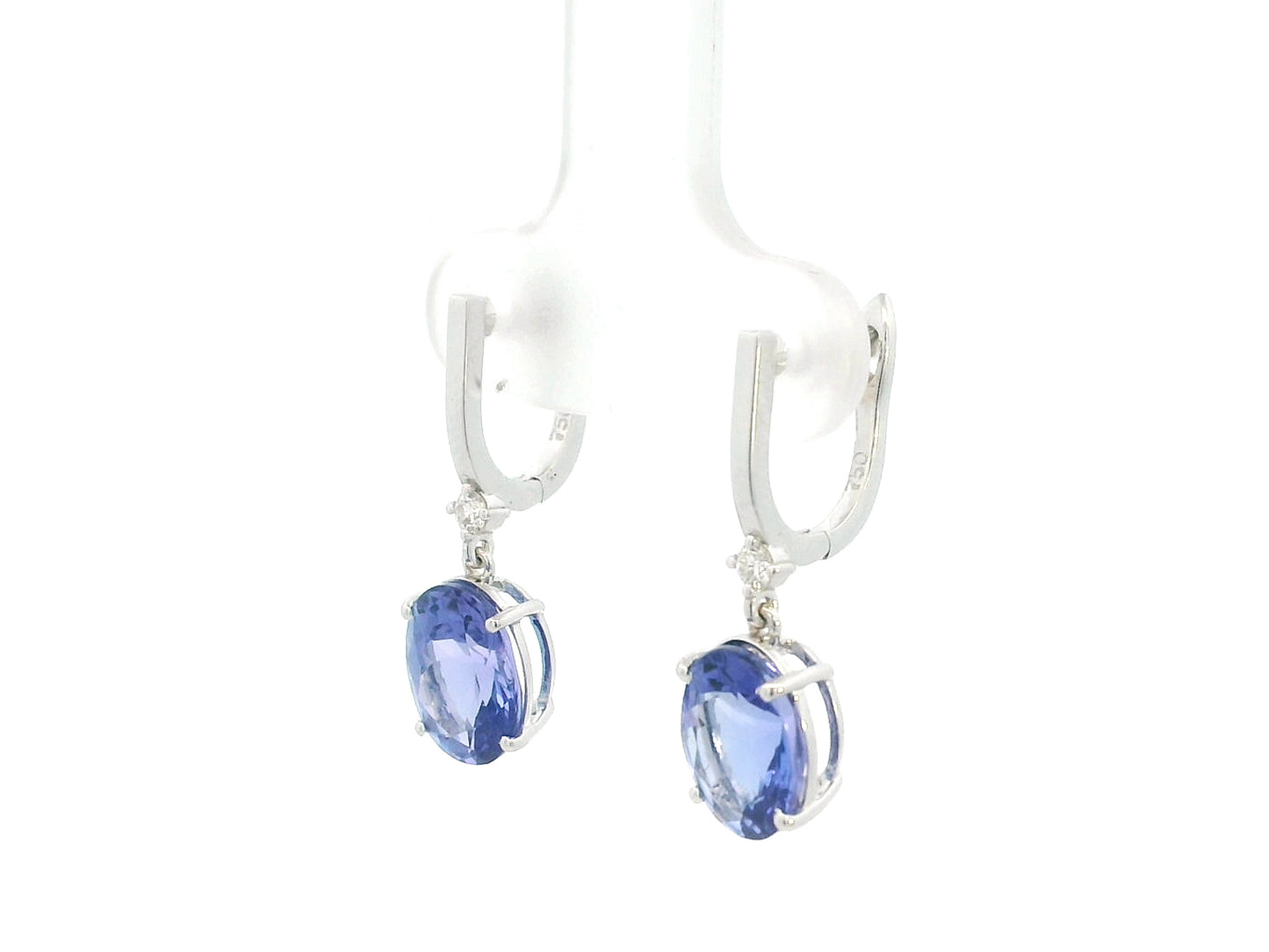 18K white gold tanzanite drop earrings with oval tanzanites and diamond accents