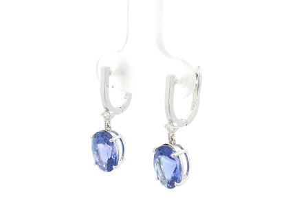 18K white gold tanzanite drop earrings with oval tanzanites and diamond accents