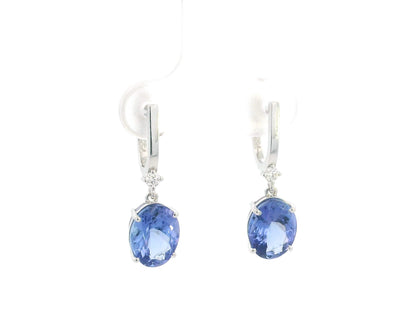 18K white gold tanzanite drop earrings with oval tanzanites and diamond accents