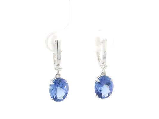 18K white gold tanzanite drop earrings with oval tanzanites and diamond accents