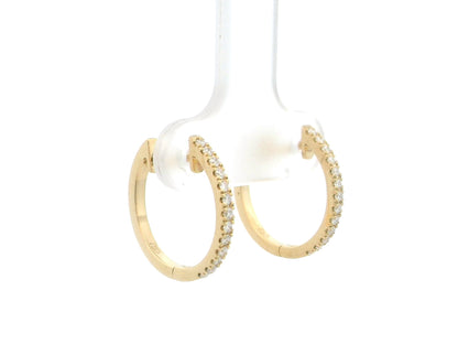 18K yellow gold diamond hoop earrings with slim minimalist design and natural diamonds