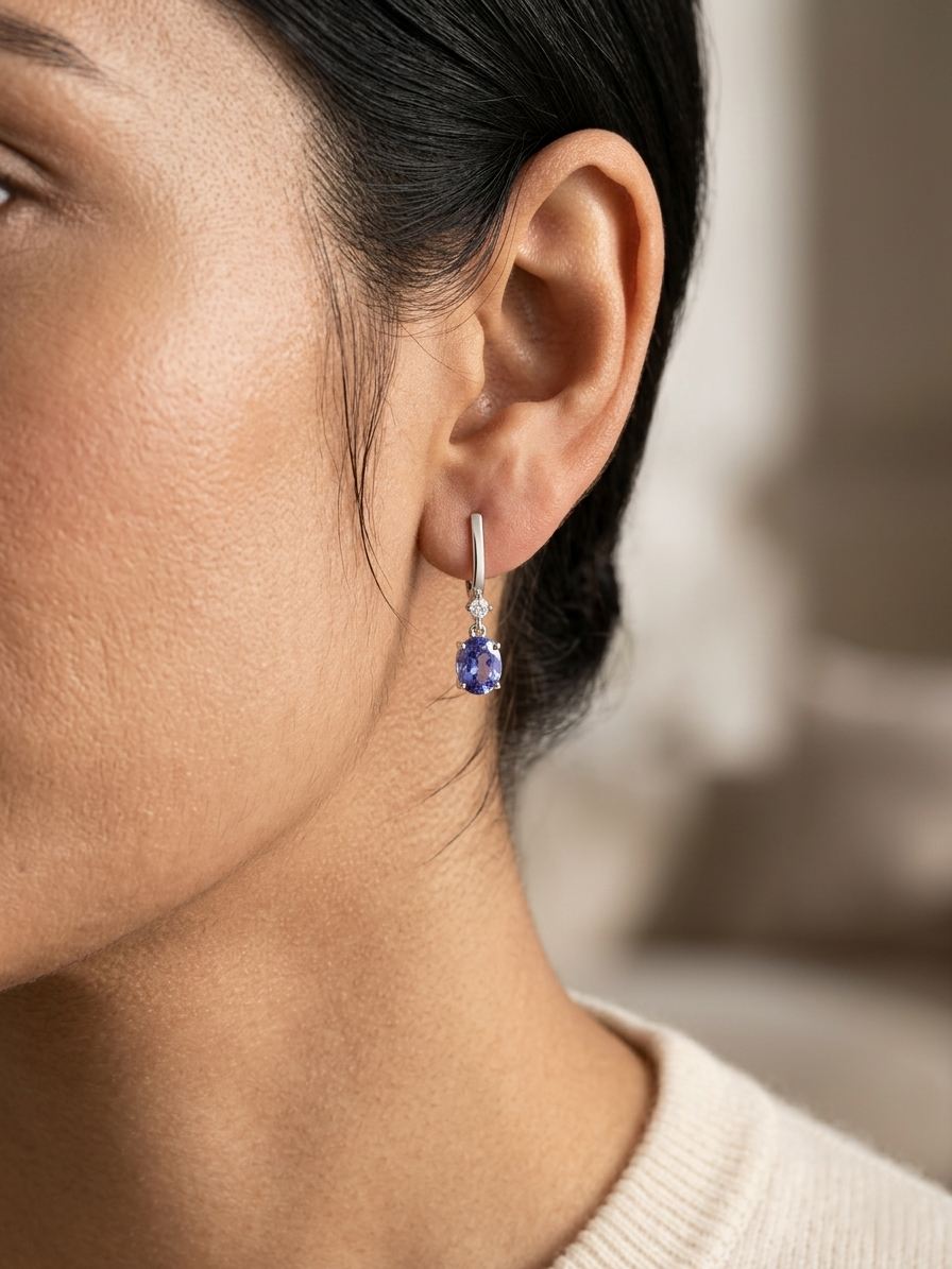 Blue sapphire and diamond drop earrings in 18K white gold
