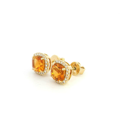 Citrine and diamond halo stud earrings in 18K yellow gold with cushion-cut citrine gemstones