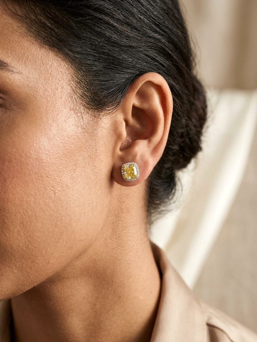 Fancy Yellow Diamond Halo Stud Earrings in 18K White Gold