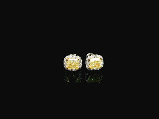 18K white gold fancy yellow cushion cut diamond halo stud earrings with GIA certified VS1 diamonds