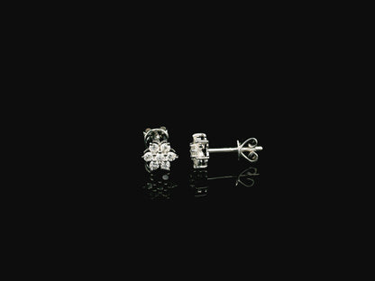 Diamond flower cluster stud earrings in 18K white gold by Emirates Diamonds