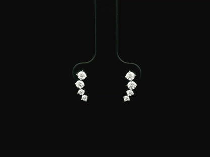 Graduated natural diamond drop earrings in 18K white gold, 0.55 carat total diamond weight.