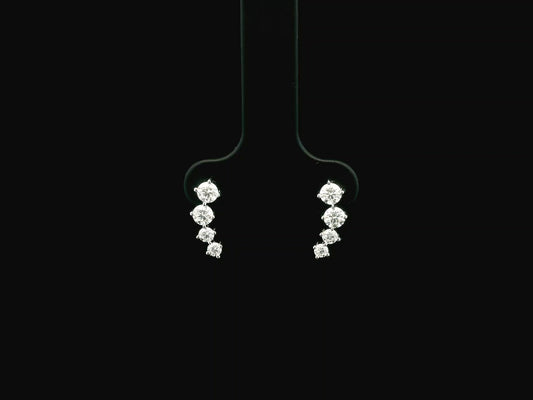 Graduated natural diamond drop earrings in 18K white gold, 0.55 carat total diamond weight.