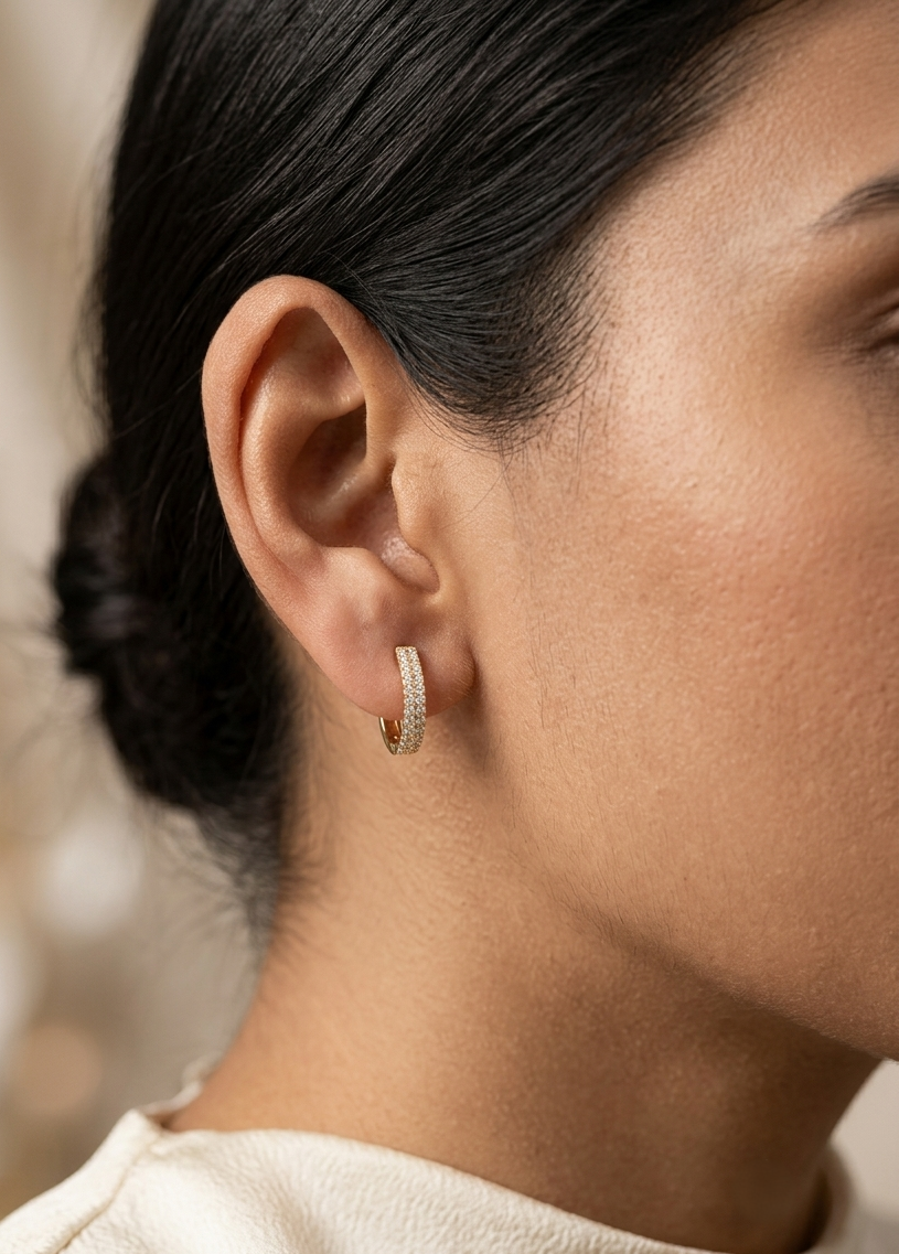 Diamond huggie hoop earrings in 18K yellow gold with 0.30 carat pavé natural diamonds