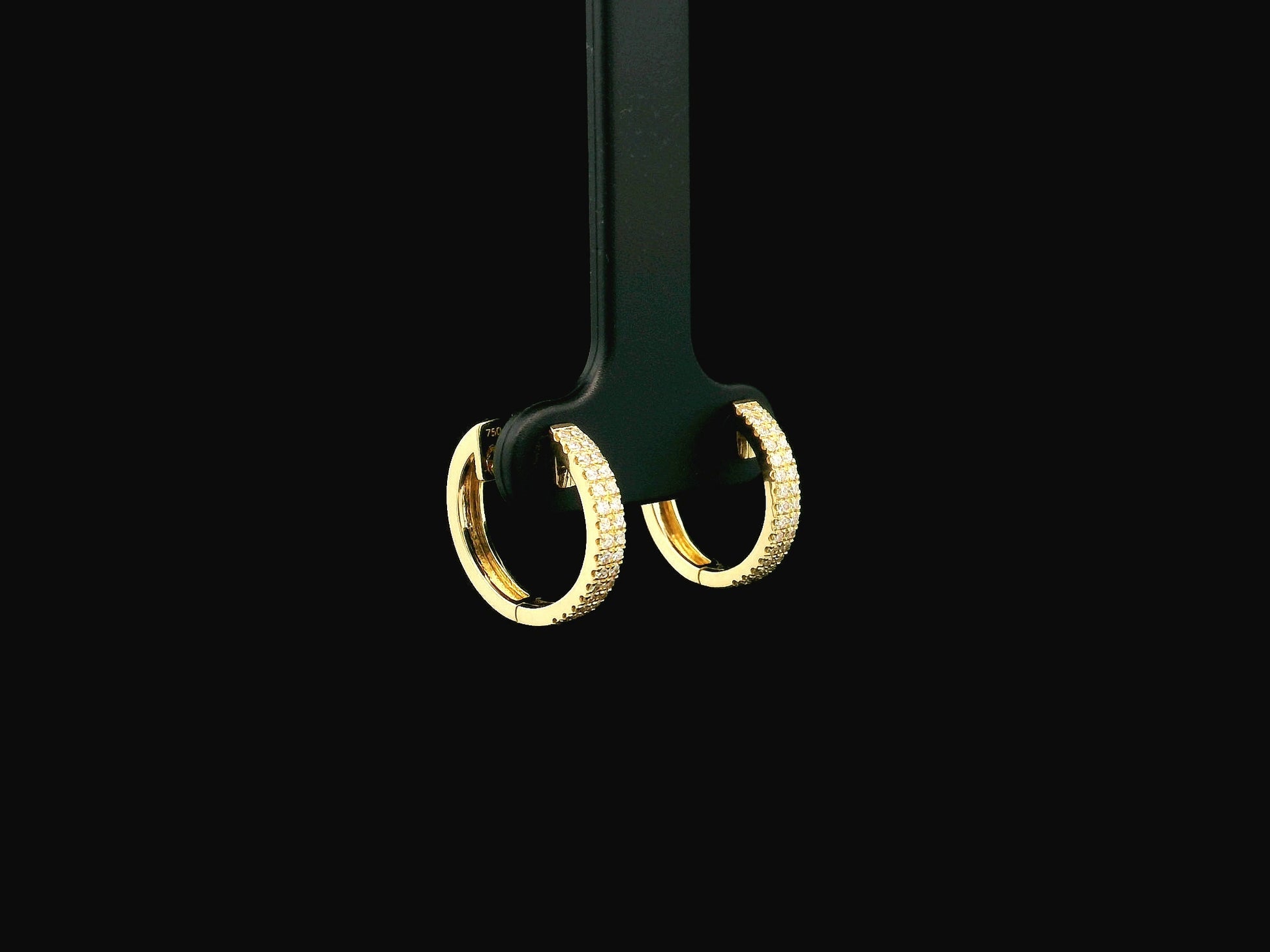 Diamond huggie hoop earrings in 18K yellow gold with 0.30 carat pavé natural diamonds