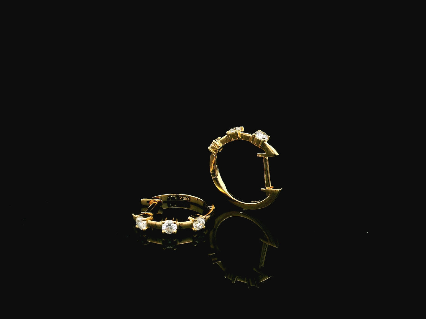 18K yellow gold diamond hoop earrings with round brilliant diamonds totaling 0.36 carat
