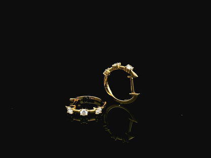 18K yellow gold diamond hoop earrings with round brilliant diamonds totaling 0.36 carat