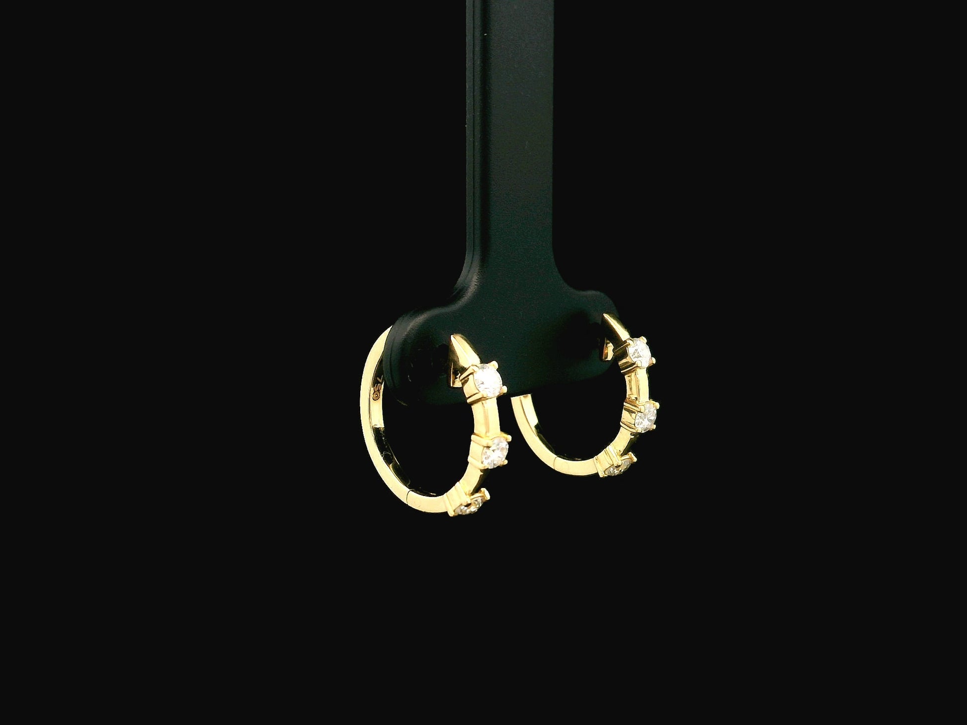 18K yellow gold diamond hoop earrings with round brilliant diamonds totaling 0.36 carat