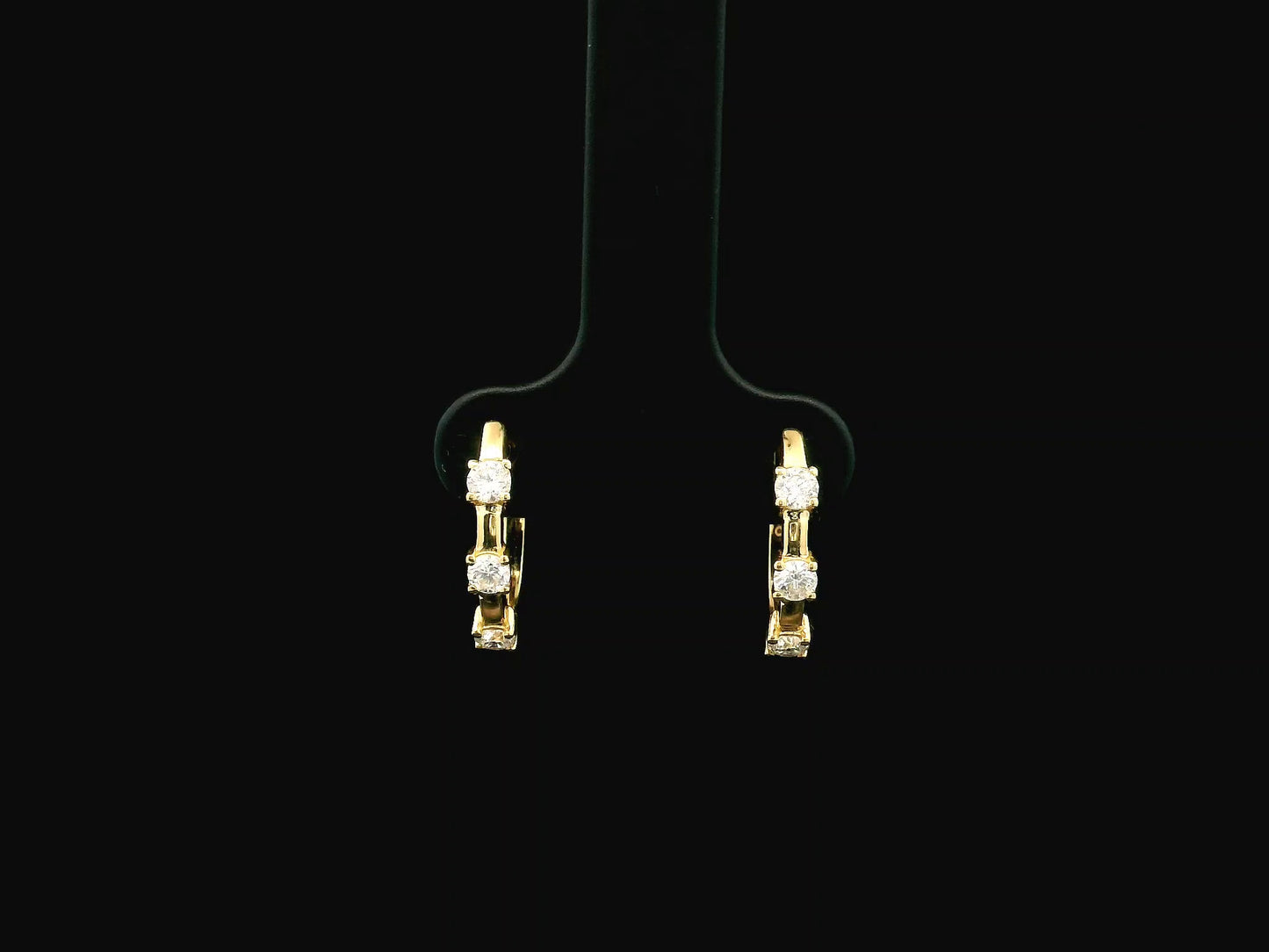 18K yellow gold diamond hoop earrings with round brilliant diamonds totaling 0.36 carat