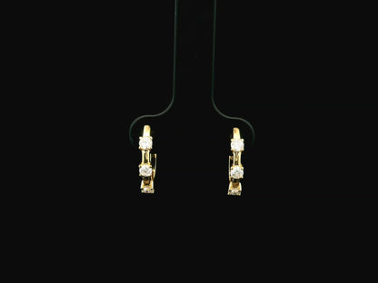 18K yellow gold diamond hoop earrings with round brilliant diamonds totaling 0.36 carat