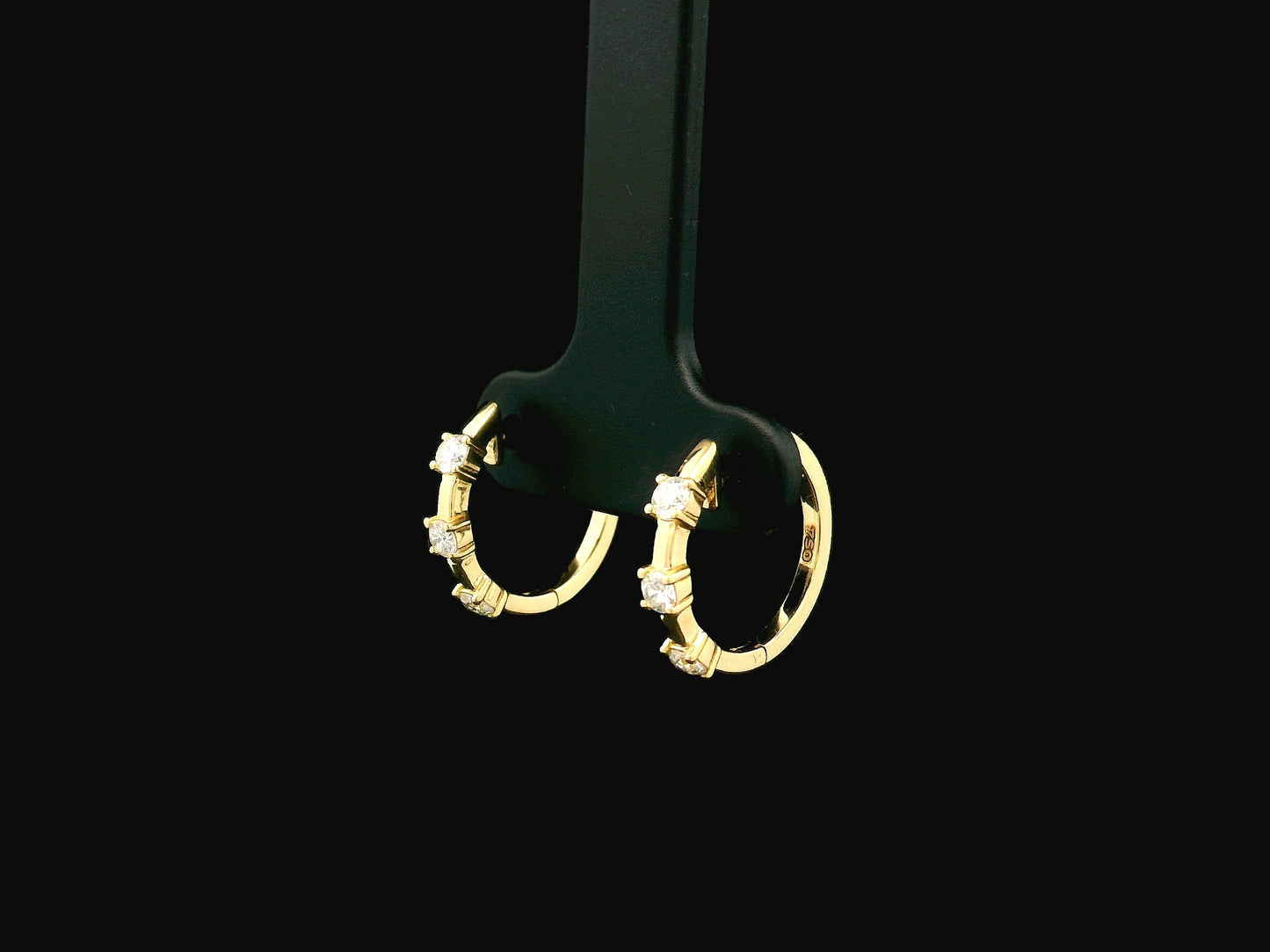 18K yellow gold diamond hoop earrings with round brilliant diamonds totaling 0.36 carat