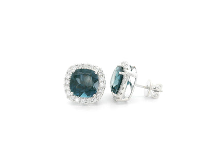 London Blue Topaz halo stud earrings in 18K white gold with natural diamond halo surround
