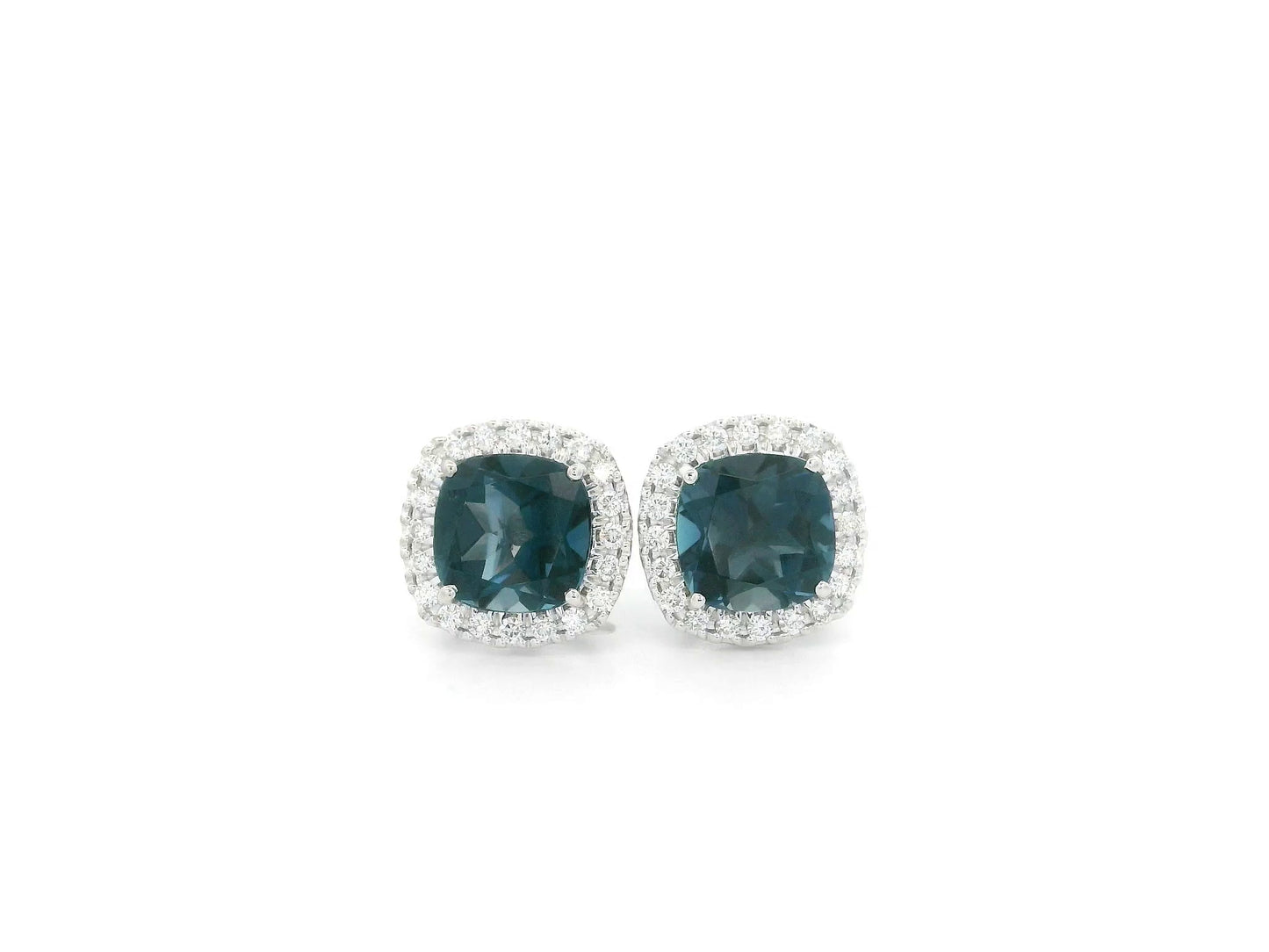 London Blue Topaz halo stud earrings in 18K white gold with natural diamond halo surround