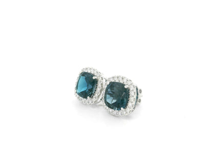 London Blue Topaz halo stud earrings in 18K white gold with natural diamond halo surround