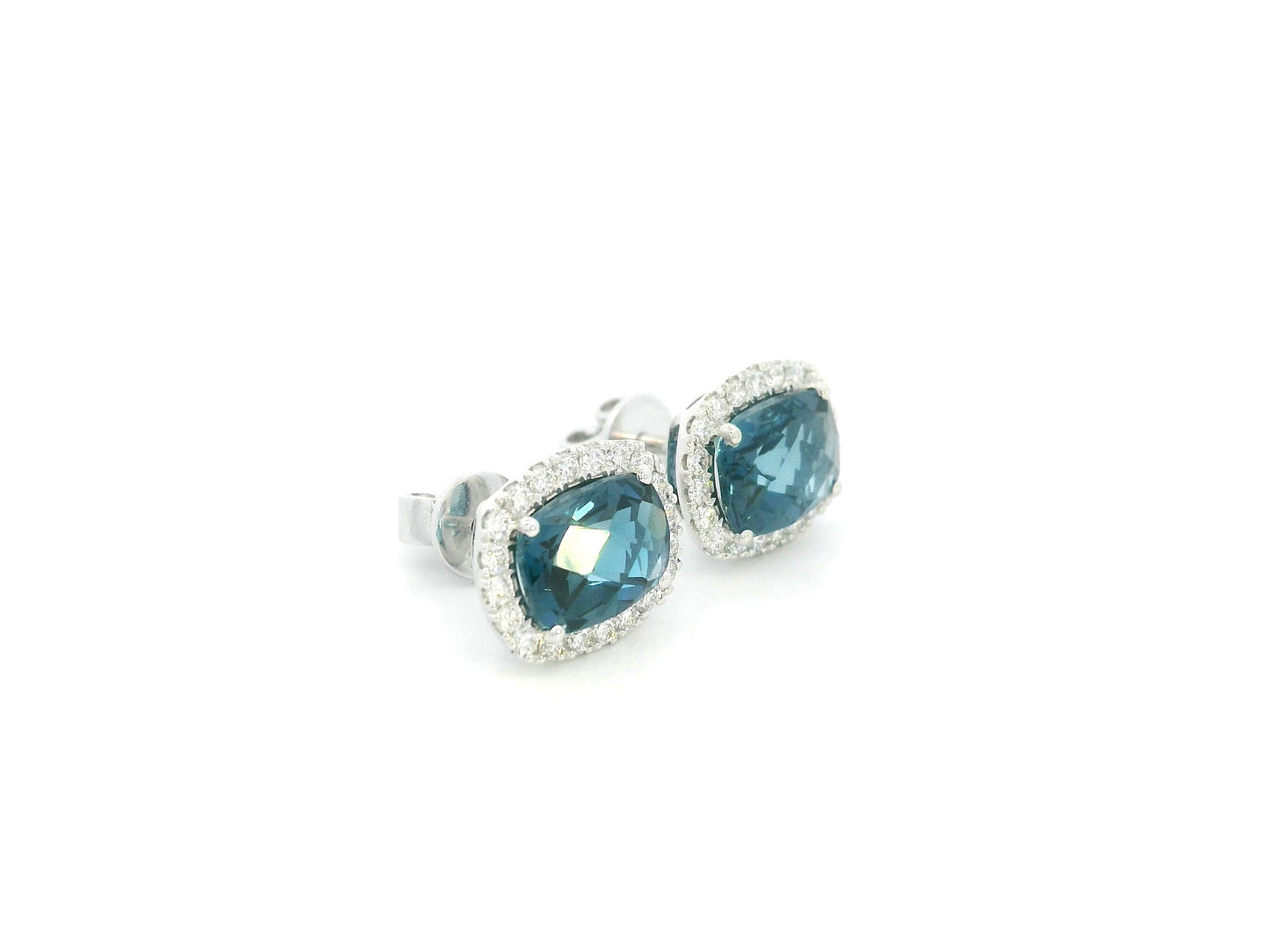18K White Gold London Blue Topaz Diamond Halo Stud Earrings featuring 3.54 carats of natural London Blue Topaz and 0.40 carats of natural diamonds.