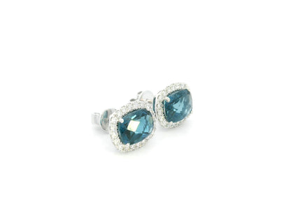 18K White Gold London Blue Topaz Diamond Halo Stud Earrings featuring 3.54 carats of natural London Blue Topaz and 0.40 carats of natural diamonds.