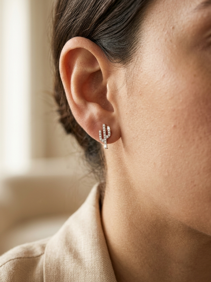 18K yellow gold cactus stud earrings featuring 0.29 carat natural diamonds with butterfly push back closures.